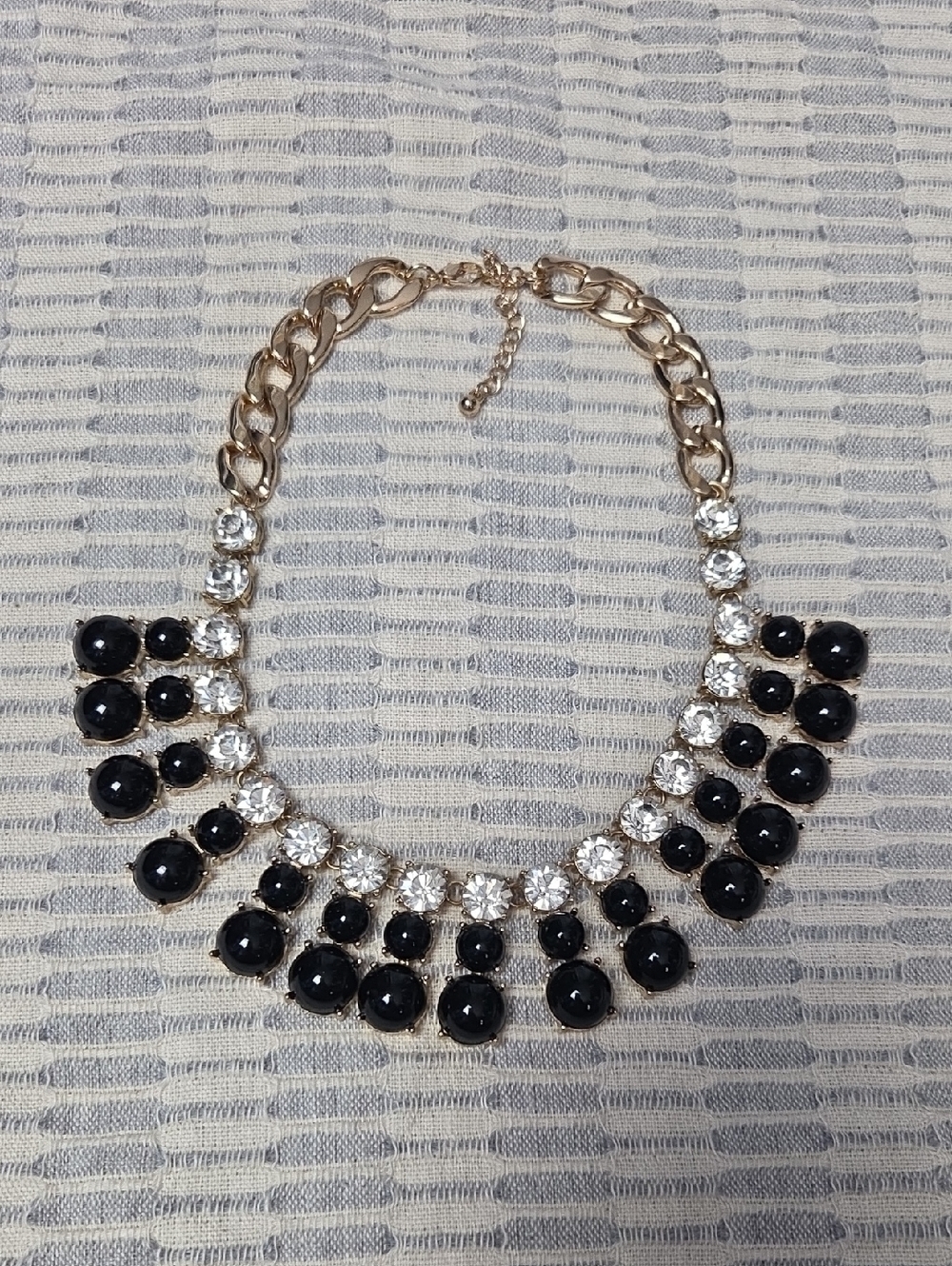 Gold-Plated Statement Necklace with Black and Clear Stones